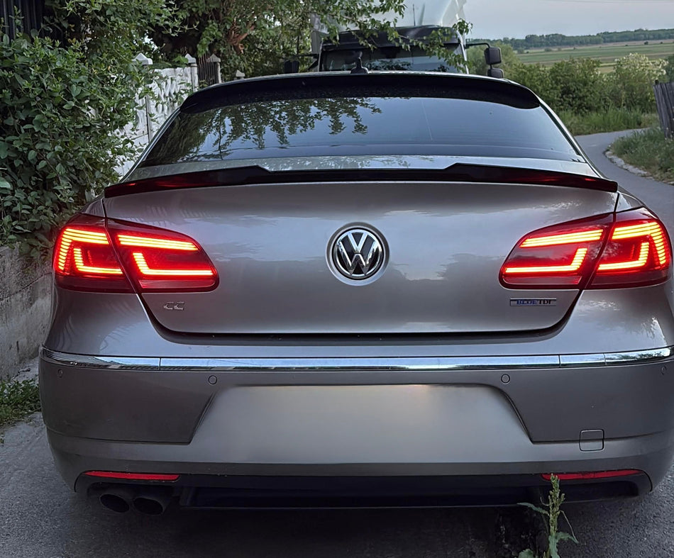 Eleron portbagaj M4 design compatibil cu VW Passat CC(2008-2017) negru lucios